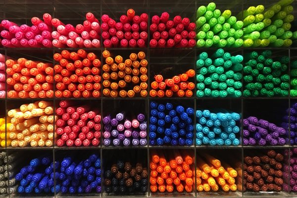 A variety of colourful pens display in a stationery shop